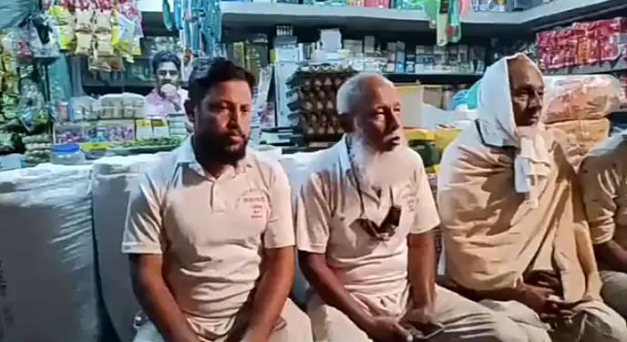 টেকনাফ থেকে তেঁতুলিয়া হেটে চলেছেন পিতা-পুত্র 