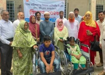 কালাইয়ে প্রতিবন্ধীদের মাঝে হুইল চেয়ার বিতরন